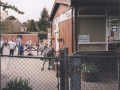 AAPC-6-1-038 -- school playground -- classroom and children playing -- 2000